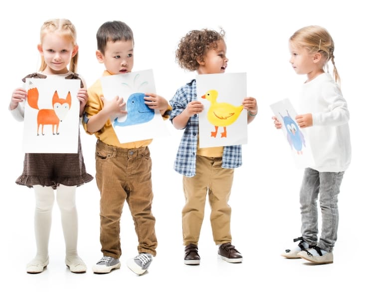 kids holding a drawing